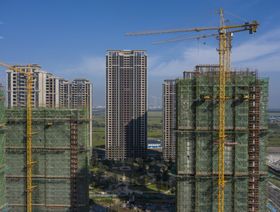 المباني السكنية الشاهقة قيد التطوير لمشروع مجموعة تشاينا إيفرجراند في تايكانغ ، مقاطعة جيانغسو ، الصين, - المصدر: بلومبرغ