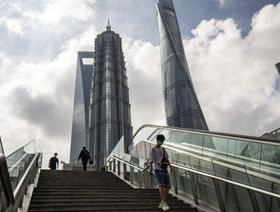 مشاة في منطقة لوجياتسوي المالية في بودونغ بشنغهاي، الصين، الاثنين، 20 يونيو، 2022. - المصدر: بلومبرغ