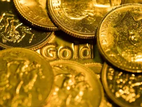 عملات من الذهب - المصدر: بلومبرغ