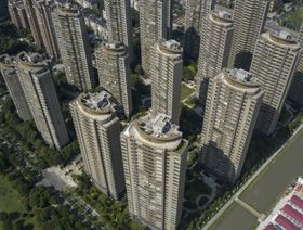 مجمع سكني شاهق الارتفاع في شنغهاي، الصين. - المصدر: بلومبرغ