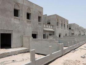منازل قيد الإنشاء - المصدر: بلومبرغ