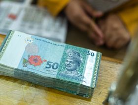 أوراق نقدية من فئة 50 رينغيت ماليزي - بلومبرغ