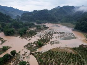 أرض زراعية دمرتها الفيضانات في منطقة قوانغشي  التي تتمتع بحكم ذاتي لقومية تشوانغ في الصين في الأول من يوليو 2024 - المصدر: بلومبرغ