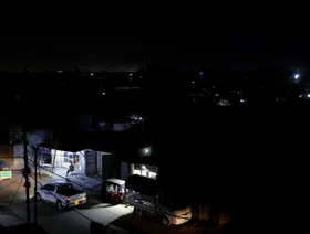 منظر عام للمدينة خلال انقطاع التيار الكهربائي في بغداد، العراق - رويترز 