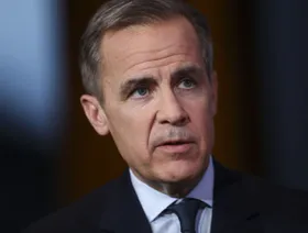 كارني يعتذر لترمب عن إعلان مناهض للرسوم الجمركية