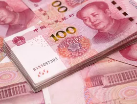 أوراق نقدية صينية من فئة مئة يوان- تصوير بول يانغ، بلومبرغ - المصدر: بلومبرغ