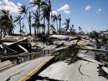 طريق مدمر في جزيرة باين بعد الإعصار إيان الذي ضرب جزر ماتلشا، فلوريدا، الولايات المتحدة، في عام 2022. - المصدر: بلومبرغ