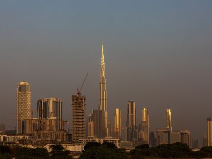 مشهد عام لمدينة دبي، ويظهر في وسط الصورة برج خليفة أعلى ناطحة سحاب في العالم. دبي. الإمارات العربية المتحدة - المصدر: بلومبرغ