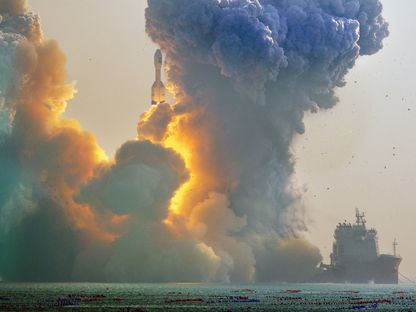 إطلاق صاروخ \"أوريانسبيس\"  مقابل ساحل هايانغ في الصين في يناير - شينخوا/ غيتي إيمجز