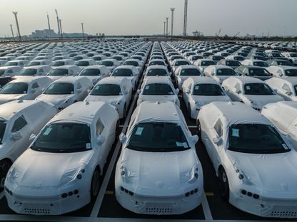 سيارات \"زيكر\" الكهربائية التابعة لشركة \"جيلي\"، متجهة للشحن إلى أوروبا في ميناء تايتسانغ في تايتسانغ، مقاطعة جيانغسو، الصين - المصدر: بلومبرغ