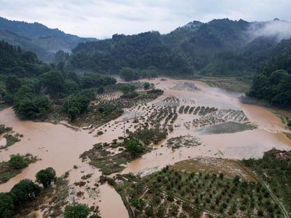 أرض زراعية دمرتها الفيضانات في منطقة قوانغشي  التي تتمتع بحكم ذاتي لقومية تشوانغ في الصين في الأول من يوليو 2024 - المصدر: بلومبرغ
