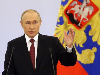 الرئيس الروسي فلاديمير بوتين يتحدث أثناء حفل التوقيع مع قادة الانفصاليين حول ضم 4 مناطق أوكرانية في قصر الكرملين الكبير، في تاريخ 30 سبتمبر 2022 بموسكو، في روسيا - المصدر: بلومبرغ