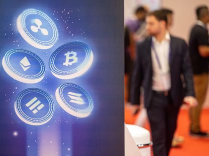 عرض لشعارات عملات مشفرة متنوعة في جناح \"Evest\" خلال معرض \"Dubai Crypto Expo\" في فستيفال أرينا في دبي، الإمارات العربية المتحدة - بلومبرغ