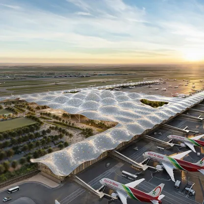 صورة فنية للمحطة الجديدة التي سيتم بناؤها في مطار محمد الخامس بمدينة الدار البيضاء، أكبر مطارات المغرب. - الشركة